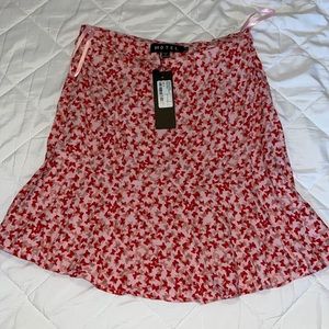 Butterfly pink mini skirt. NWT